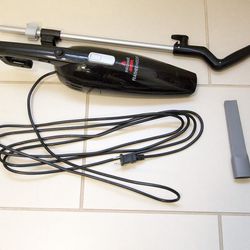 Bissell handheld bagless canister vacuum with attachment

