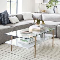 WEST ELM Mid-Century Art Display Marble Coffee Table (46")   Overall: 46"w x 26.1"d x 17"h. Bottom shelf: 46"w x 24"d. Shelf spacing: 6.6". Clearance 