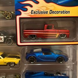 Very Hard To Find Hotwheels 10 Car Pack With Exclusive Decoration 62 Chevy Truck and blue Bugatti looking to trade for other diecast cars or make offr