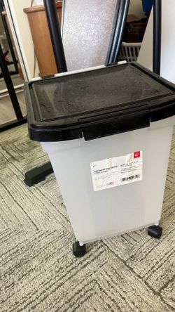 Dog food container with wheels