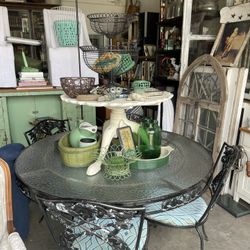 Used wrought iron table and chairs hot sale