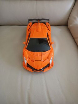 $35 Orange toy car, Can turn into a robot!