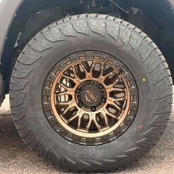 17x9 Combat Lock Off-road Rims And Tires 285/70/17 RBP AT
