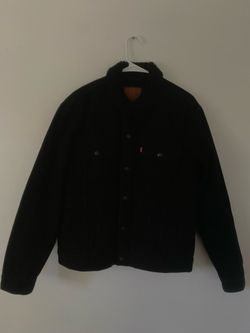 Levi's Men's Relaxed Fit Sherpa Trucker Jacket in black canvas/denim.