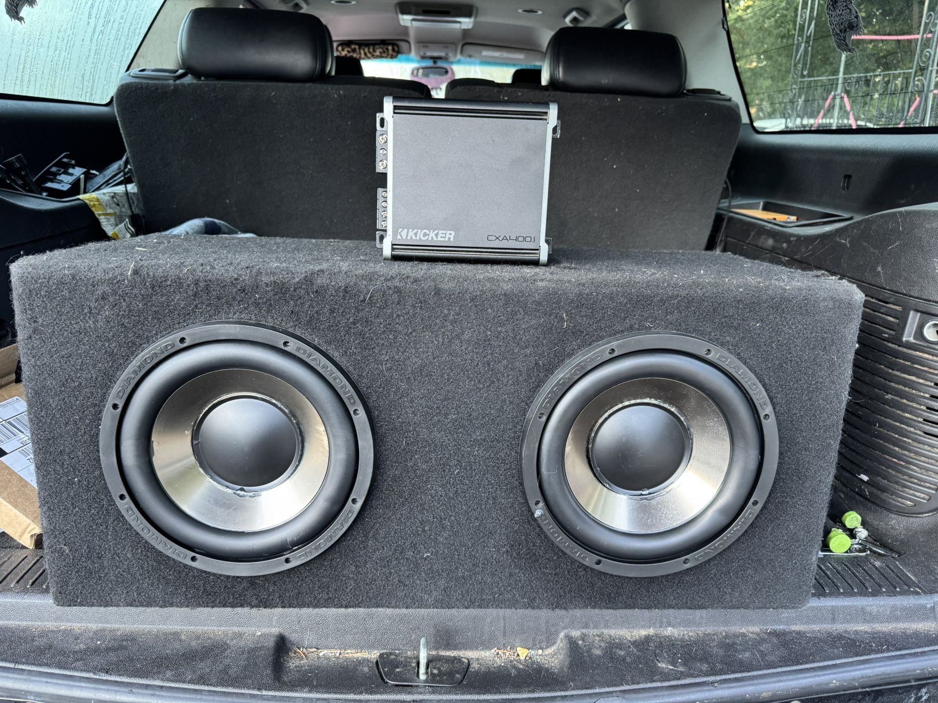 2 10"Diamond Audio D3 in box and Kicker Cxa400.1D amp