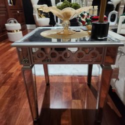 Two mirror glass end tables