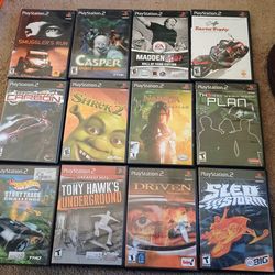 Lot of 12 PlayStation 2 games with manuals