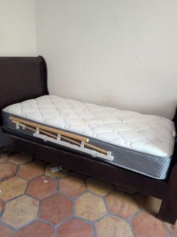 Twin bed with mattress and box spring