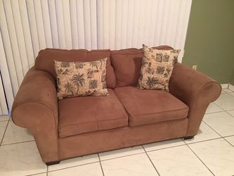 Suede loveseat and sofa.