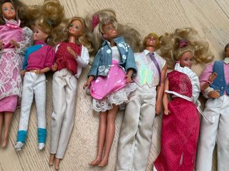 9 Barbie Dolls