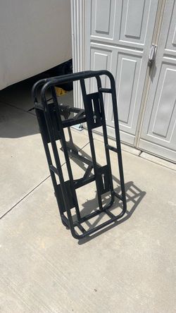 Cargo cage over spare tire rack