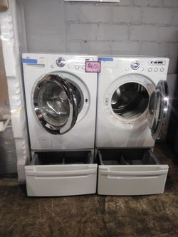 LG front load washer and dryer set with pedestals in excellent condition