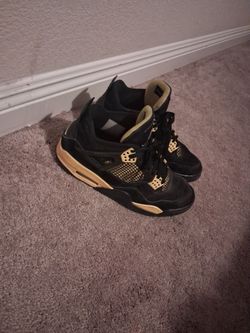 Air Jordan 4 Black and yellow Sneakers