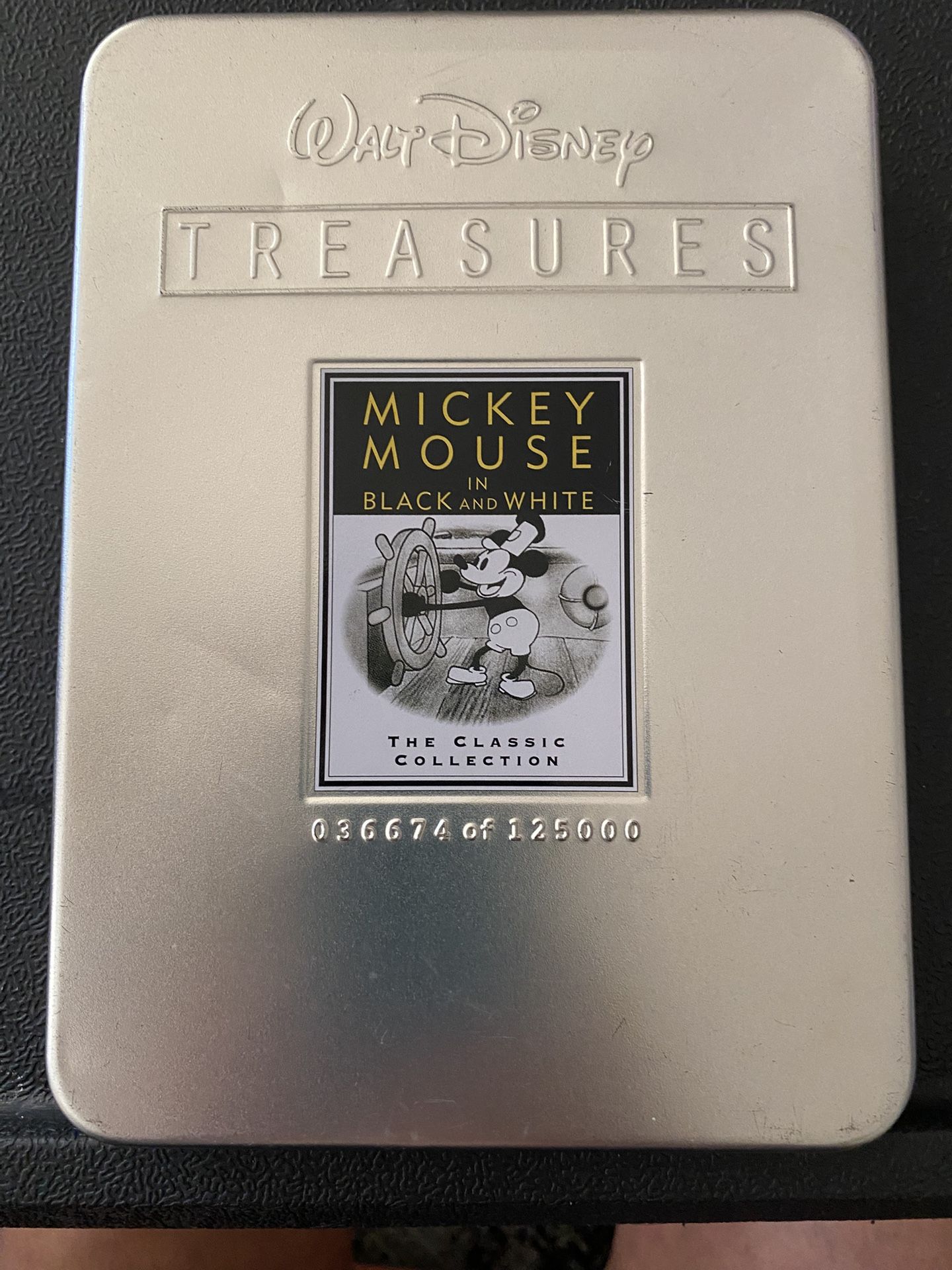 Mickey Mouse in black-and-white two CD series. Walt Disney Treasures. The classic collection. Open box but never ran/used. Small dent on tin - front