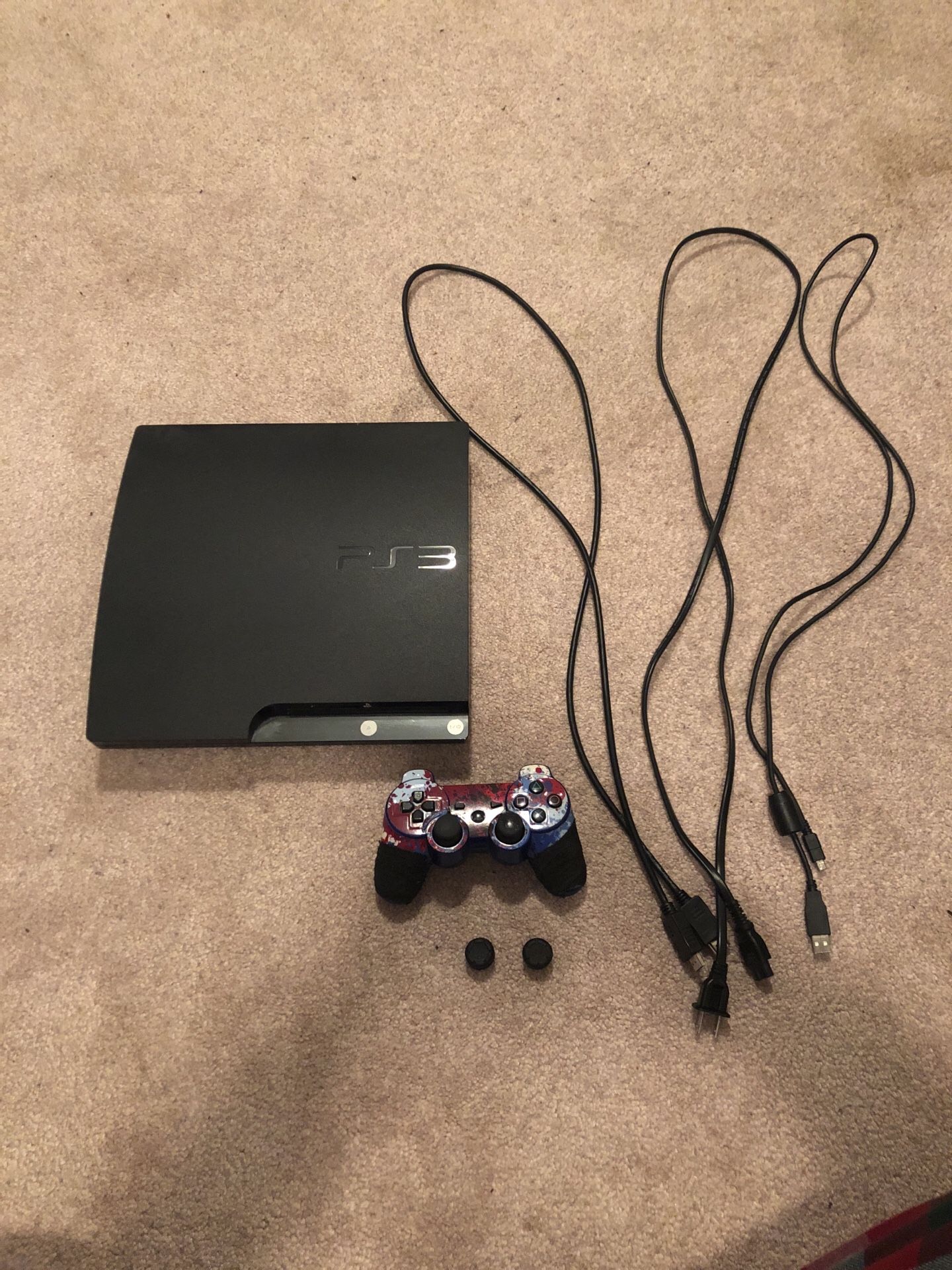 PlayStation 3 w/ controller and games