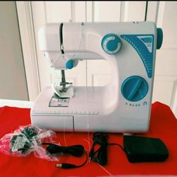 MINI SEWING MACHINE NEW CONDITION