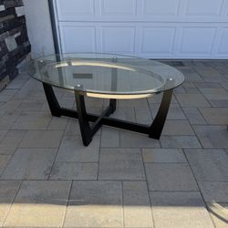Oval Glass Top Wooden Base Table