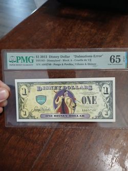 2013 $1 Disney Dollar Dalmations Error PMG 65