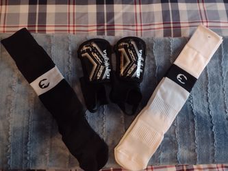 Diadora shin guards for kids, size 3T to 4T, Plus Two Pairs Of Puma Soccer Stockings