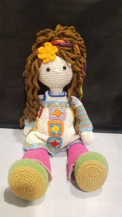 Hand knitted doll