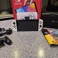 OLED Nintendo SWITCH/ 2 GAMES