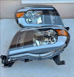 05-11 Toyota Tacoma LED DRL Headlights
Luces Micas Calaveras Faros Faroles Focos Headlamps