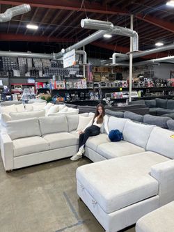 U shaped  fabric sectional with chaise + storage