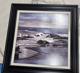 This is a Highland Dunes 'Blue Sea Sunset II' Framed Graphic Art Print featuring a black frame and textured matting