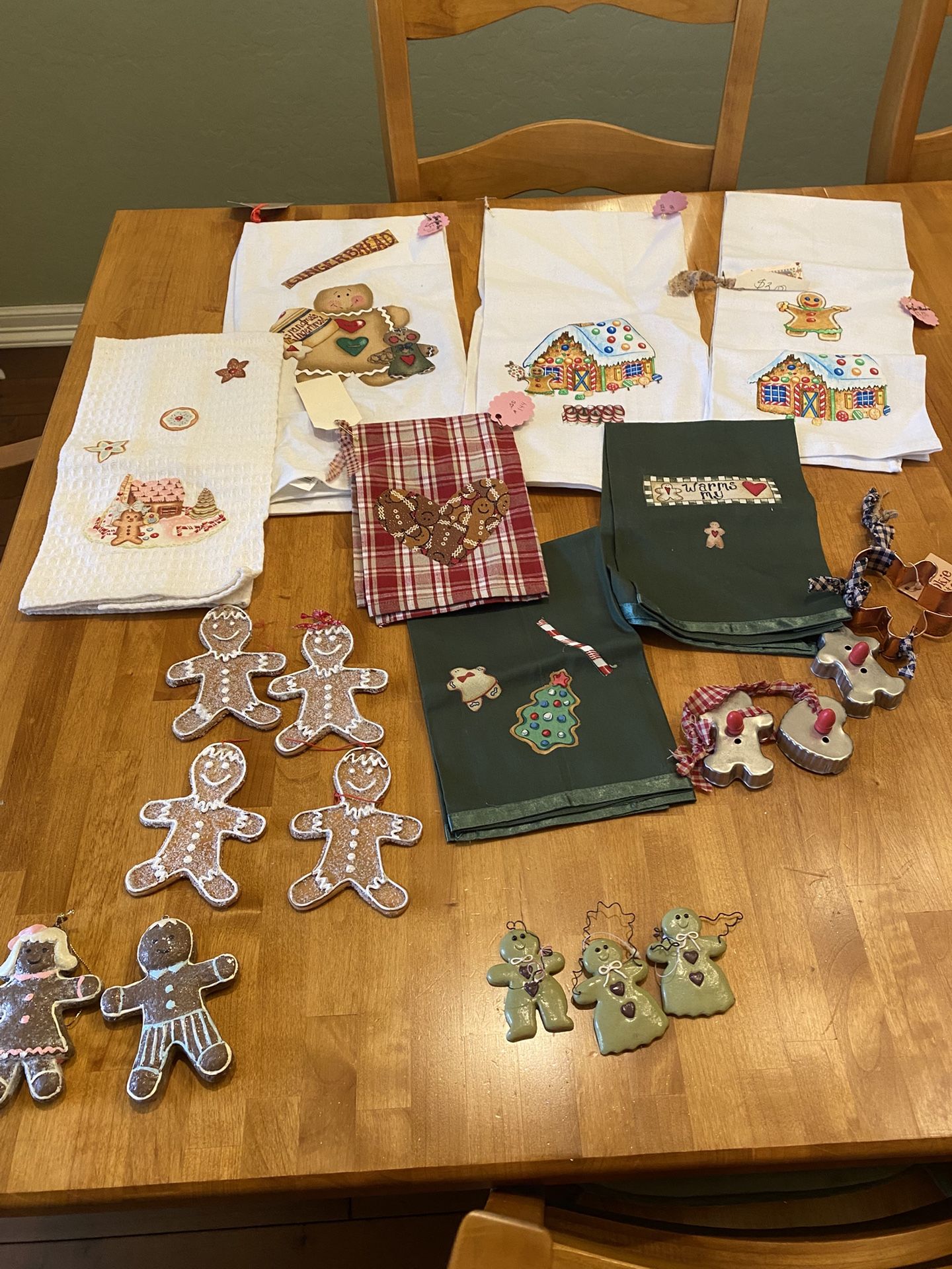 Gingerbread ornaments/ hand towels/ cookie cutters. Sold as sat. Christmas. All are new !