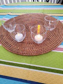 Tea lite holders in excellent condition. Tea lites and mat not included