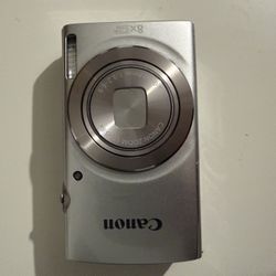 SLIGHTLY USED- Canon PowerShot ELPH 180 Point & Shoot 20.0MP 8x Optical Zoom Silver 2.7" LCD