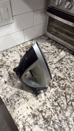 Working Black and Silver Steam Iron