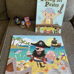 Pirate puzzle, toy figures and book toy bundle