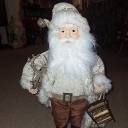 Vintage Santa holding a Reindeer & Sleigh