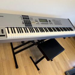 Yamaha Motif ES8 keyboard with bench, stand, and foot pedal