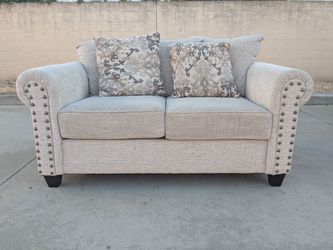 Beige Fabric Loveseat with Nailhead Trim