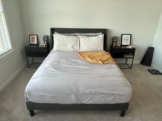 Upholstered wingback platform bed