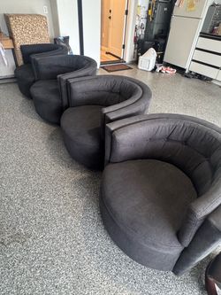 4 black swivel Chairs