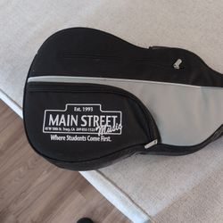 Guitar And Traveling Case