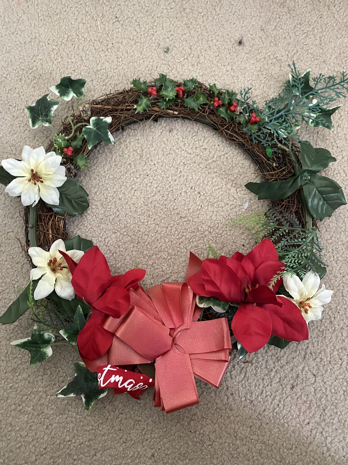 Christmas Wreath with Flowers and Bow