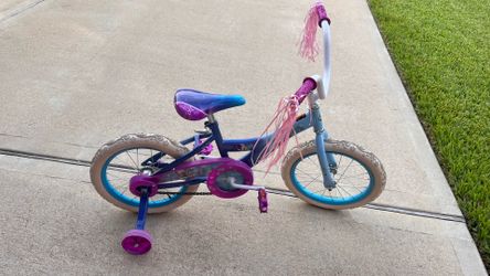 Disney Frozen themed child's bicycle and training wheels.