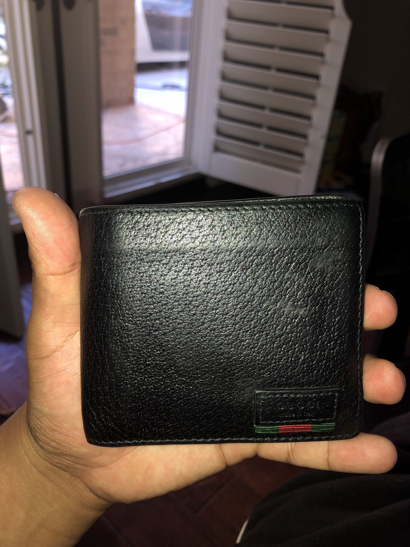 Gucci Leather bi-fold wallet with web (Authentic)