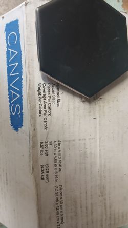 14 boxes of black hexagonal tile