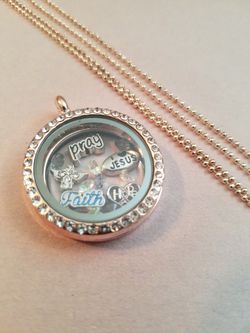 $7 includes necklace, locket and 6 charms