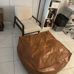 Mid Century Modern Beige Wood Chair And Leather Ottoman 