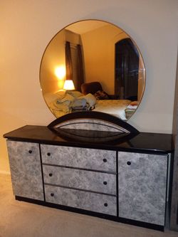 Matching bedroom set - Armoire, dresser with mirror and two night stands.