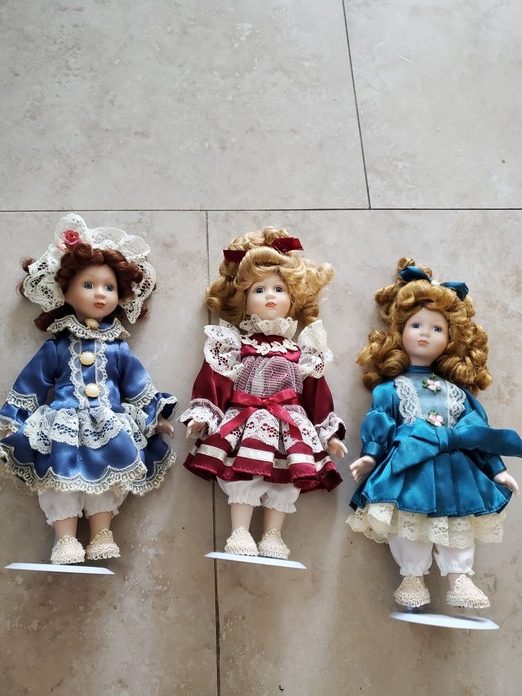 11 New Small Porcelain Dolls On Stands $5 Each