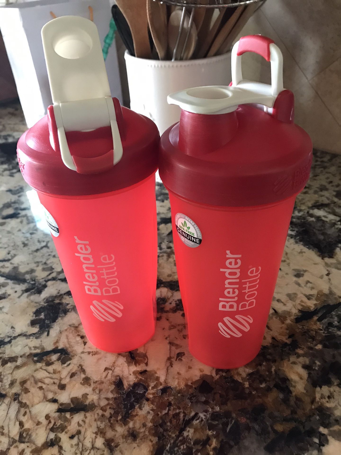 2 red blender bottles