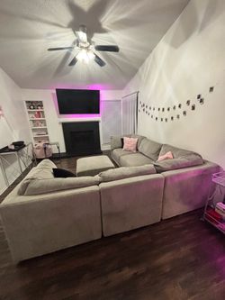 Gray Modular couch with ottoman