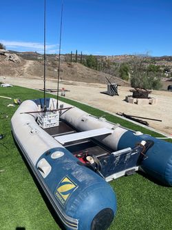 11’ Zodiac with 15hp Johnson